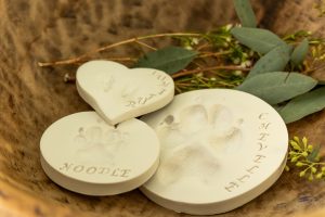 Clay paw print keepsakes with pet names